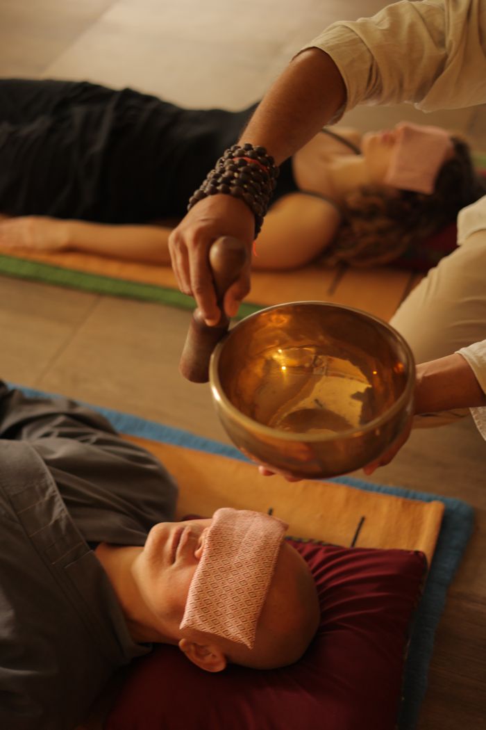 team-01 Peaceful meditation session using a singing bowl for sound therapy.