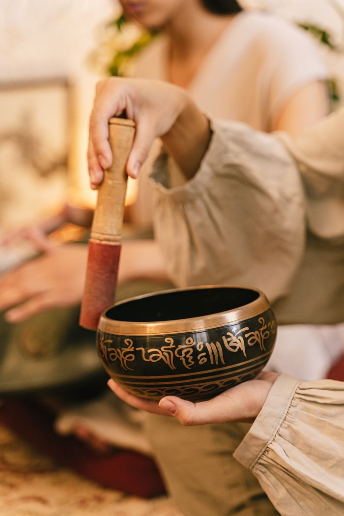 team-03 Peaceful atmosphere with a Tibetan singing bowl, promoting relaxation and mindfulness.